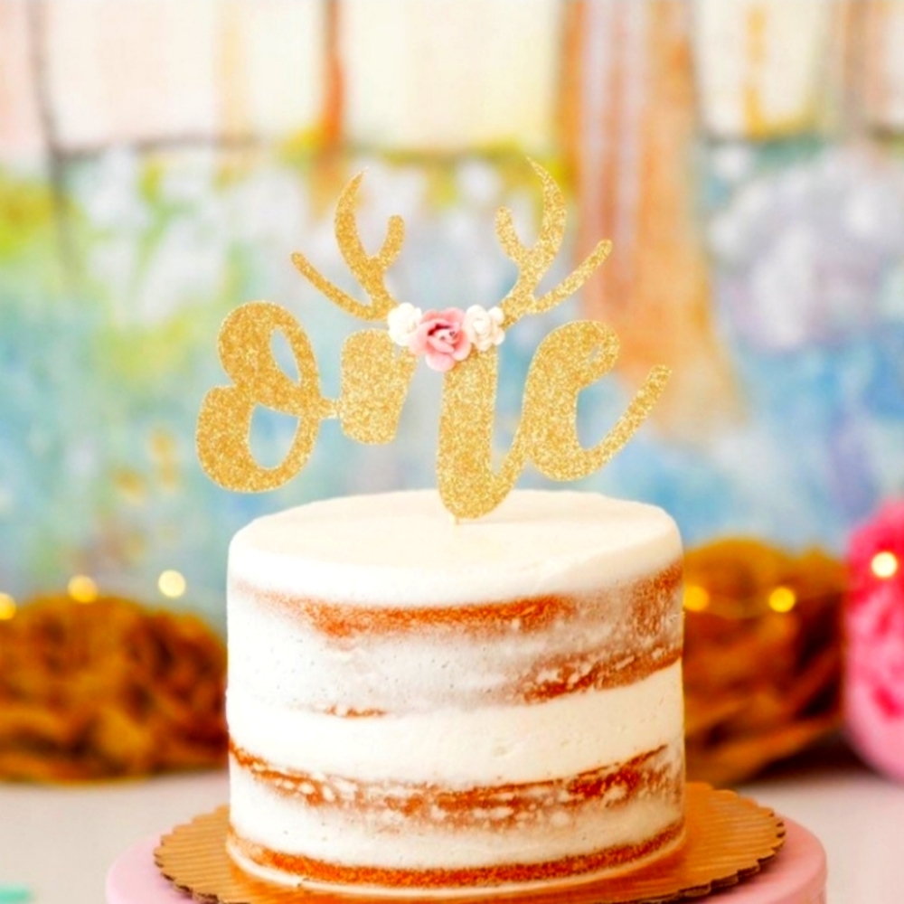 Cake topper (deer antlers with for one year old never used)